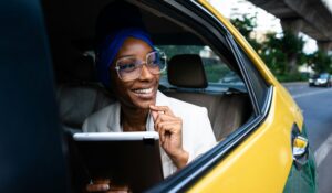beautiful business women driving at the airport leaving on for a working travel