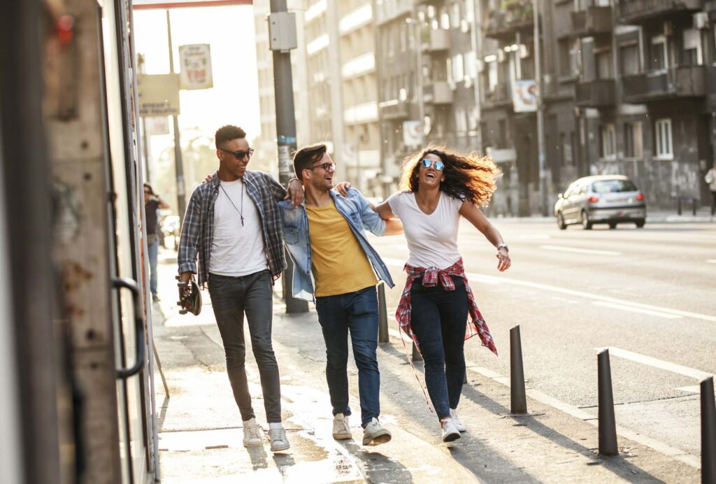 Group of friends hangout at the city street.