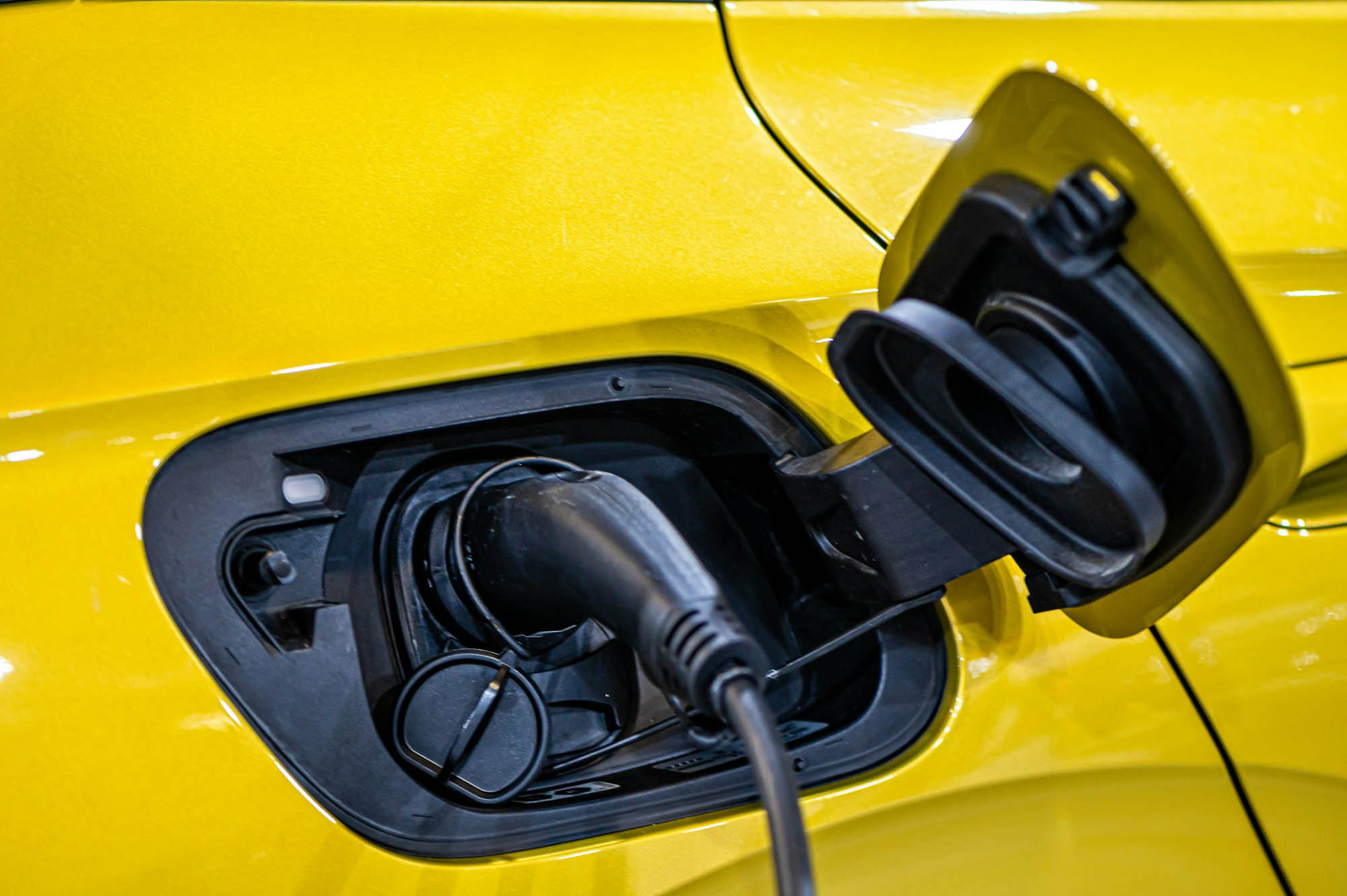 vw id4 electric car connected to the charger, eco friendly technology